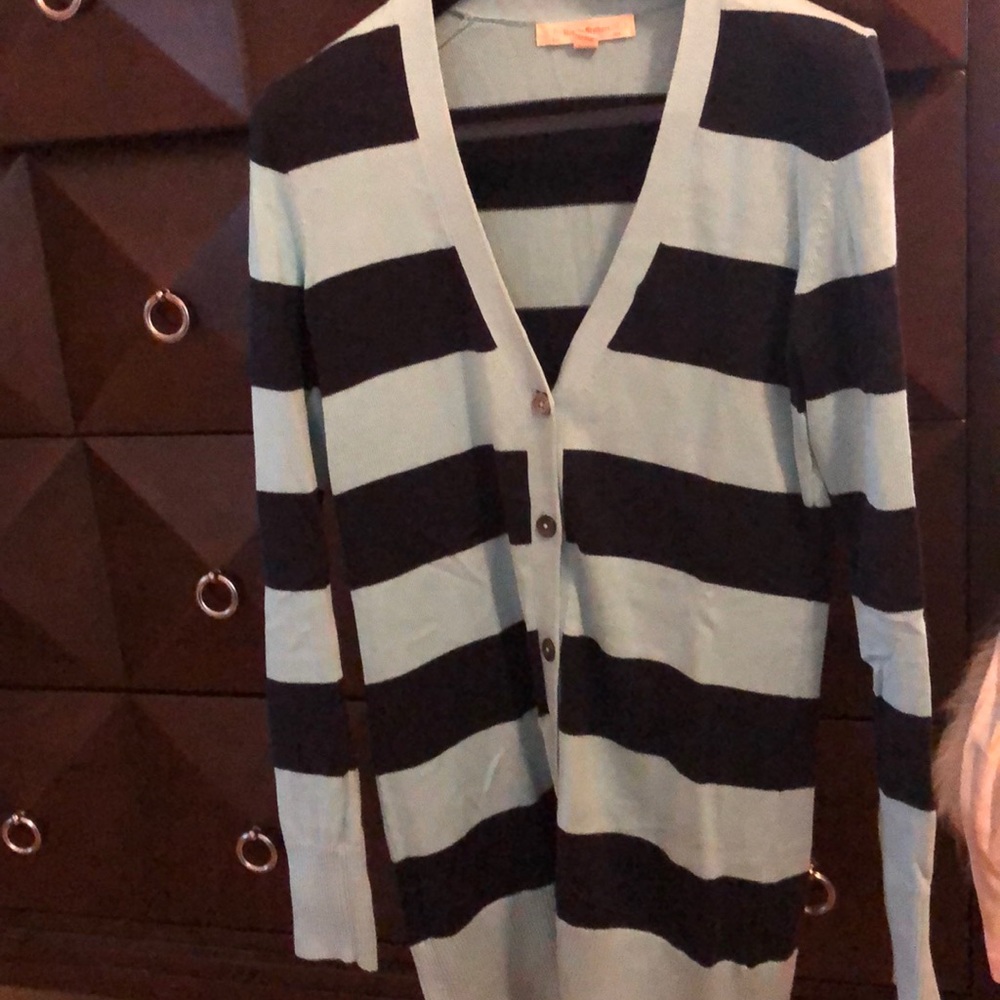 Never worn.  Light and dark blue